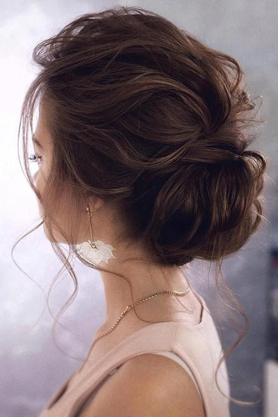 20 Trendy Low Bun Wedding Updos and Hairstyles 2023