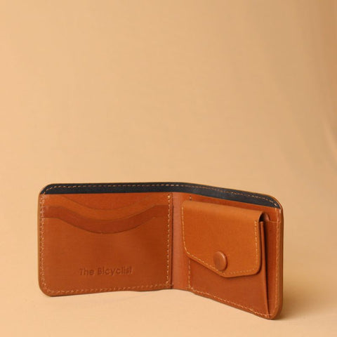 Open View of a standing Leather Bifold wallet in Tan from The Bicyclist with a coin pouch and three card slots