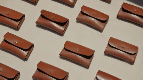 Multiple Tan Full Grain Leather Card Cases from The Bicyclist arranged alternately