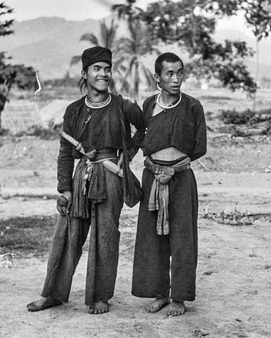 Young Shan men wearing an early version of fisherman pants