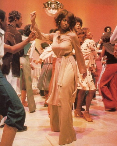 70's Disco Outfits: Woman Dancing on Soul Train