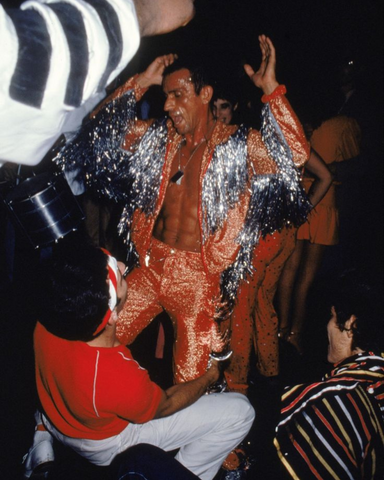 Disco Outfits for Men: Man dancing at the disco