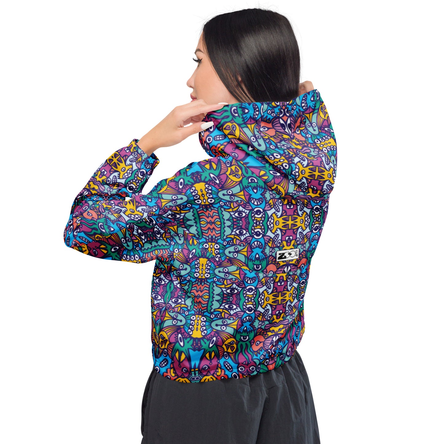 Whimsical design featuring multicolor critters from another world Women’s cropped windbreaker. Back view
