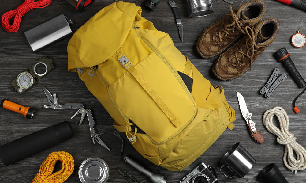 Hiking gear resting on wooden desk