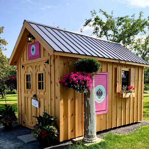 A photo of a small wooden shed that houses Waupoos Butter Tarts