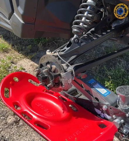 Close-up photo taken of red Safe Sled. Image from safesledoffroad.com