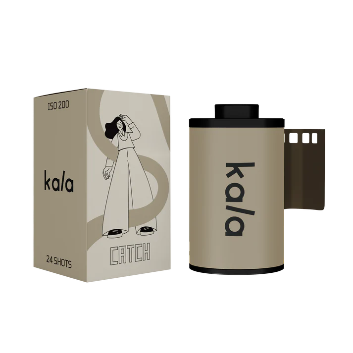 Film roll and box with modern design featuring a person in wide-leg pants.