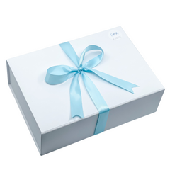 white gift box with blue satin ribbon