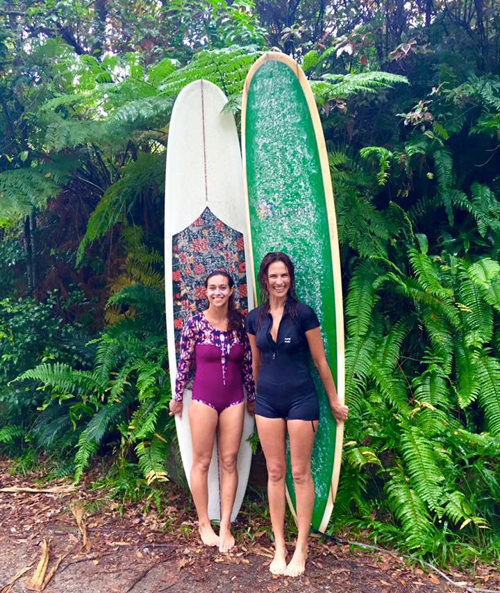Isabelle Braly and friend women surfers with surfboards 