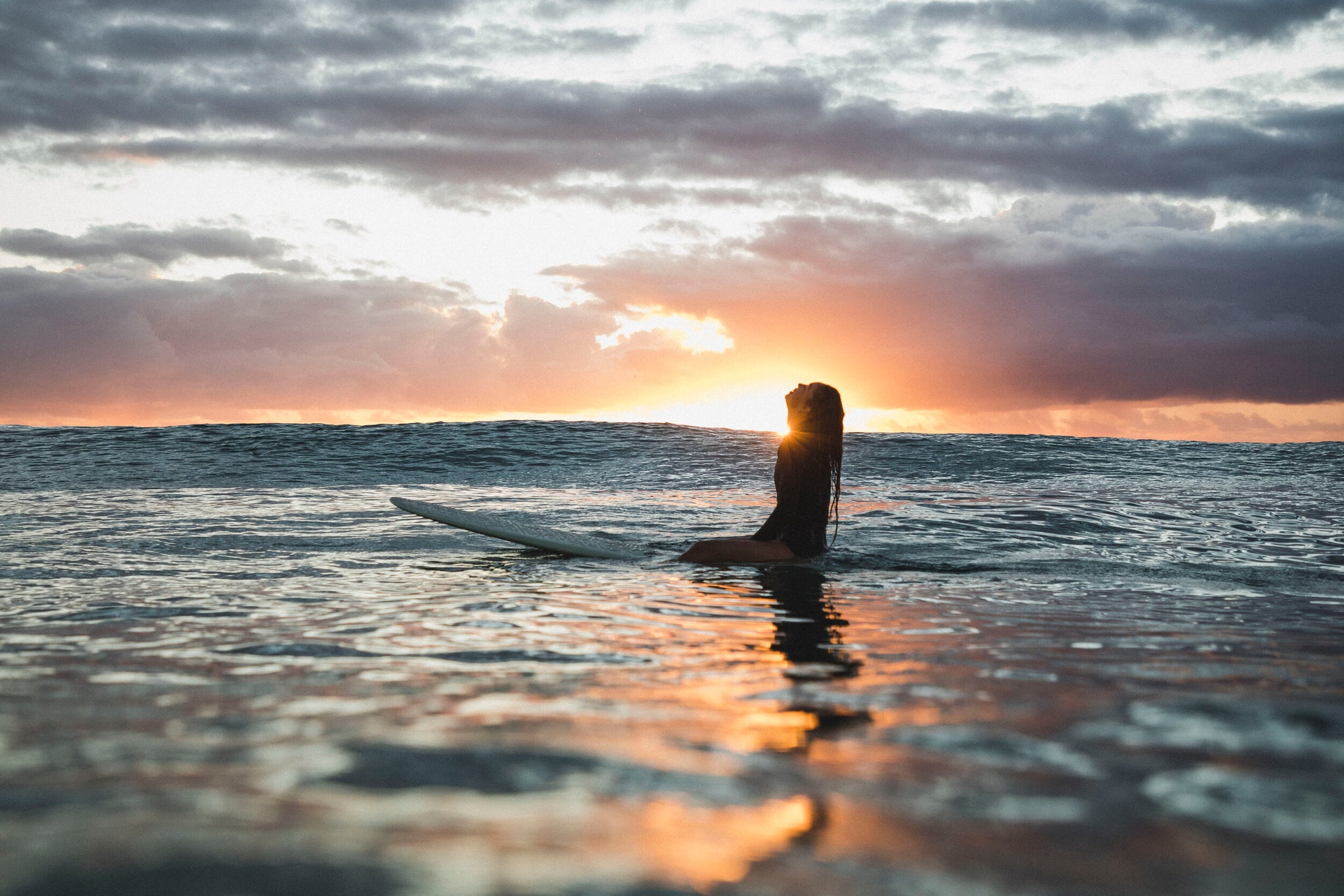 sunrise ocean surfer woman 