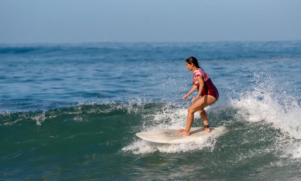 woman surfing pregnant