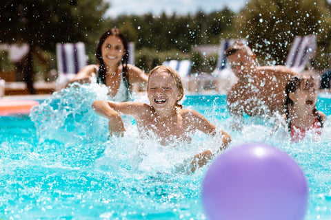 An image of a family swimming, worry-free because their diabetic supplies are protected by type one style products