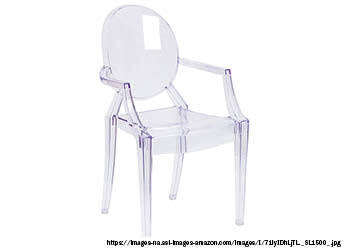 A photo of one or more ghost chairs, which are made of clear or translucent plastic and feature a minimalist and futuristic design. The chairs may have a traditional chair shape or a more sculptural and abstract form. The photo may show the chairs in a dining room, living room, or outdoor patio setting, arranged around a table or standing alone. 
