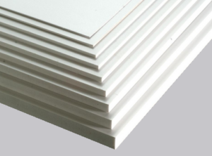 The image showcases a stack of PVC boards, also known as polyvinyl chloride boards, used for various construction and DIY projects.