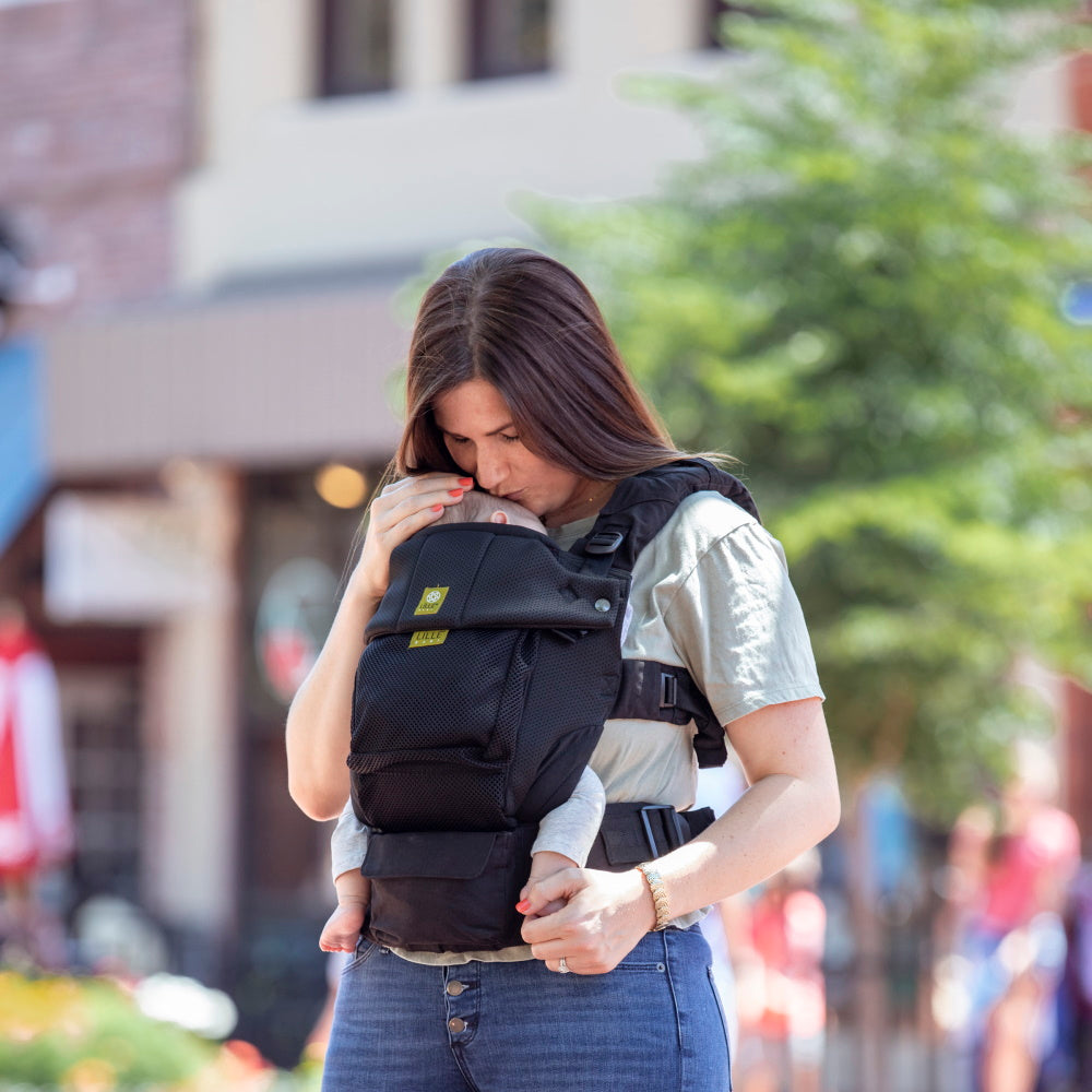 Mother bonds with baby - baby carrier, babywearing, baby wrap, needs and preferences to consider: comfortable, customisable, ease of use, organic, eco-friendly, support - Belly Beyond New Zealand
