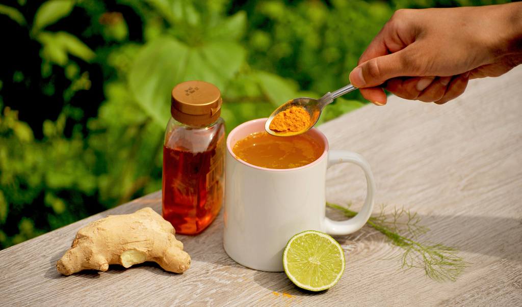 medicinal turmeric tea with honey, ginger and lemon