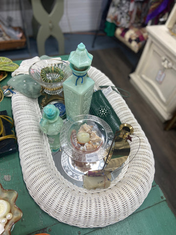 Wicker Mirror as a Tray on Steamer Trunk for Coffee Table