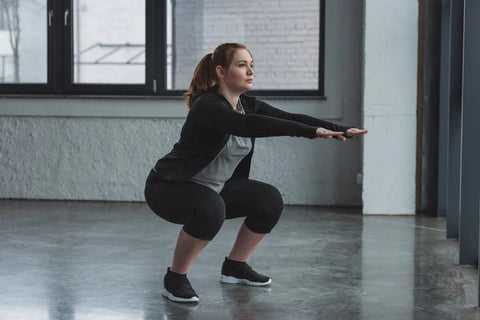 Woman in squat position.