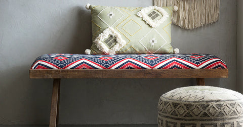 Wooden bench with tribal woven fabric cushion