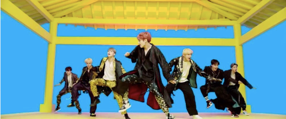 BTS in black modern hanboks for "Idol" music video