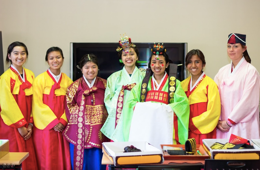 Seven women modeling upper class women's hanboks