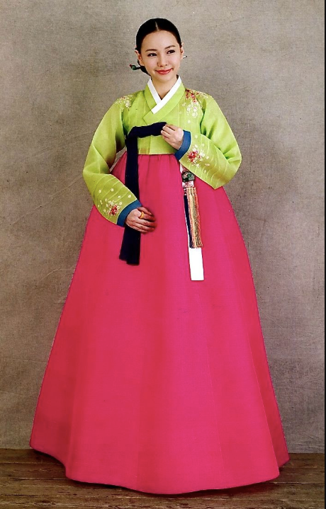 Woman wearing a pink chima over green jeogori