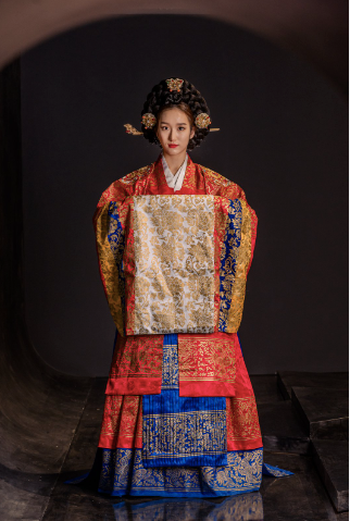 A woman wearing wonsam and wedding hanbok