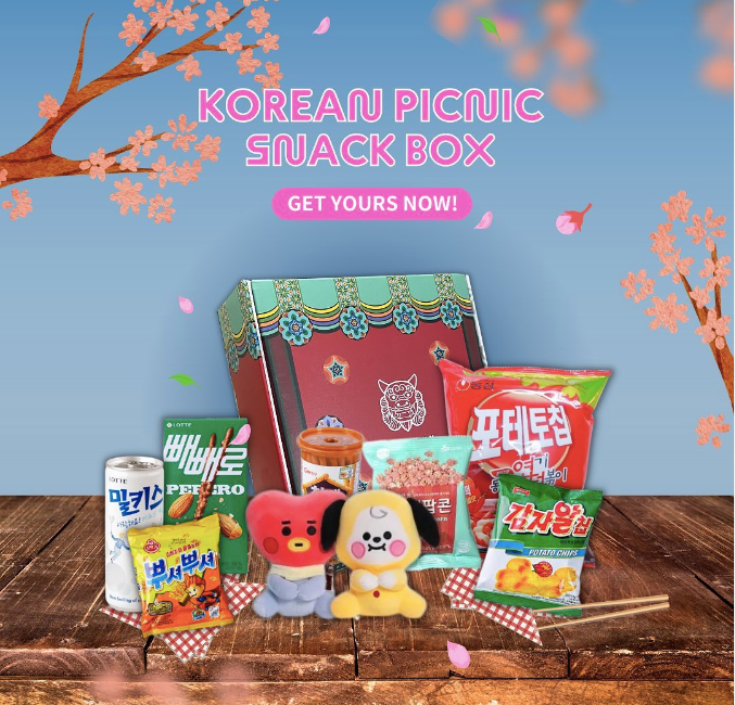 Promo image for May 2023 Picnic Seoulbox with cherry branches in the background