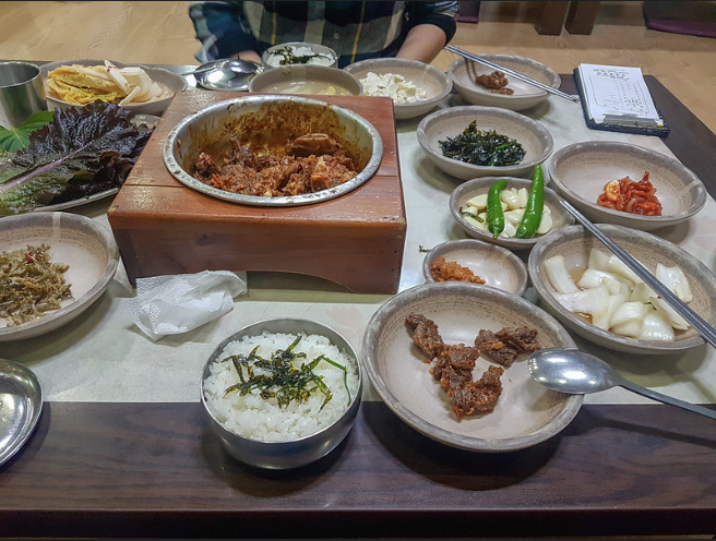 Braised short ribs with various banchan