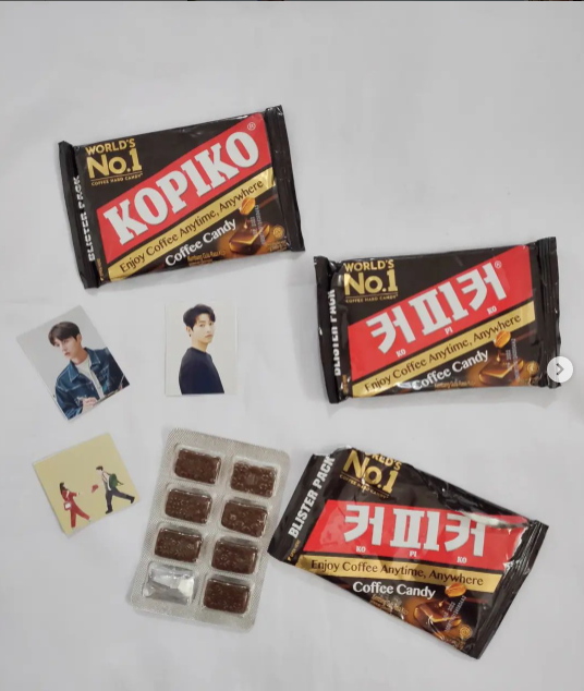 Kopiko candy packages with candies and photocards 