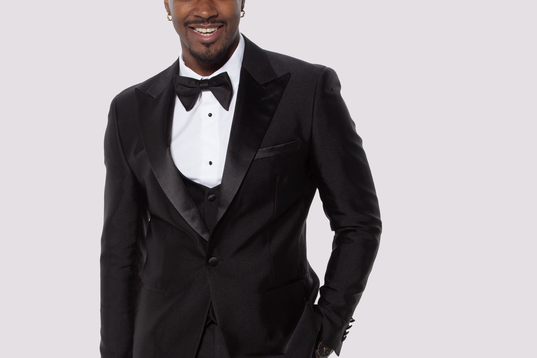 Man wearing a black tuxedo for a black tie event