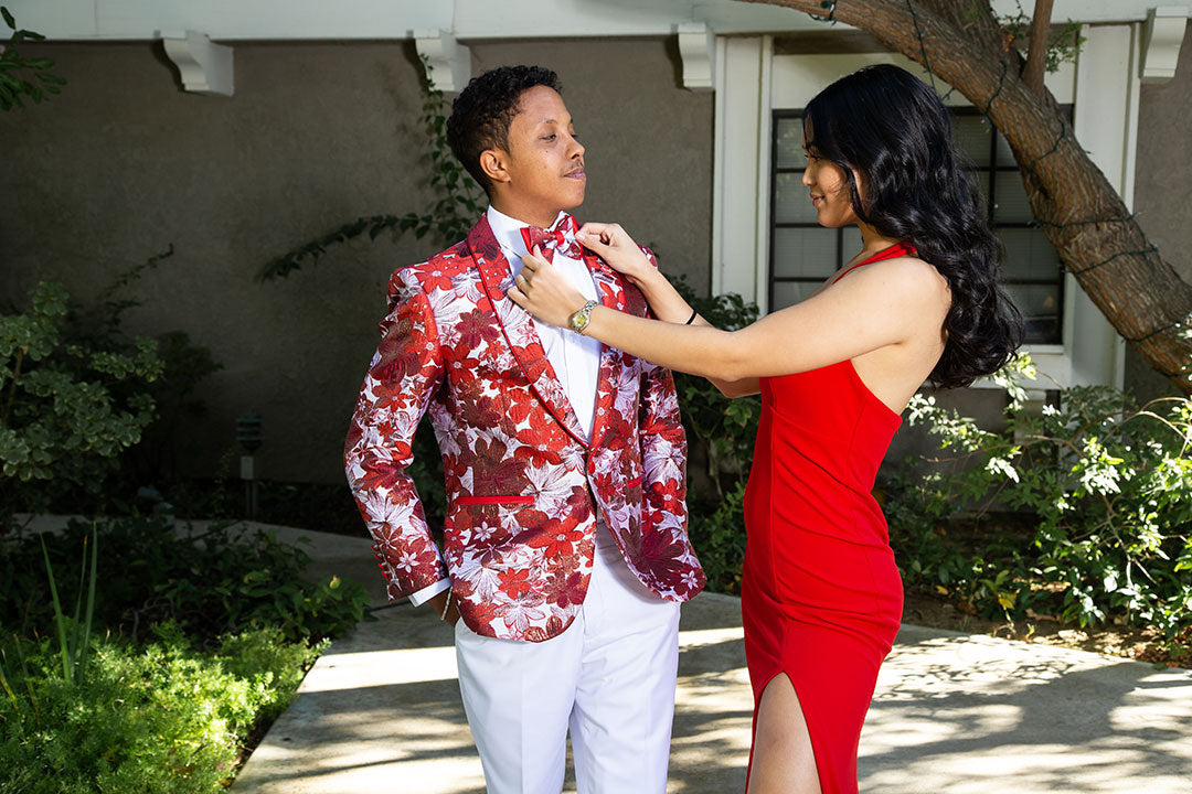 guy wearing red prom blazer with date