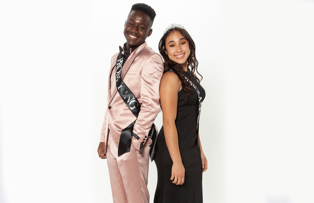 Prom couple guy wearing satin prom suit