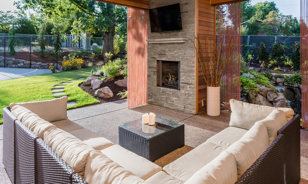 a rustic style patio overlooking a sunny garden