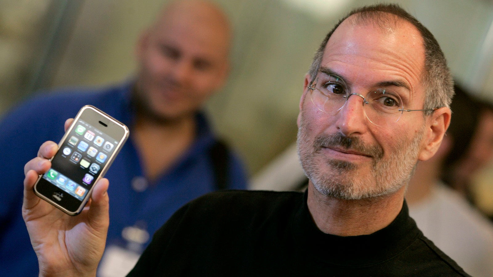 Steve Jobs with Original iPhone in 2007