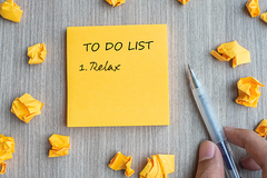 To-do list on notepad with relax written