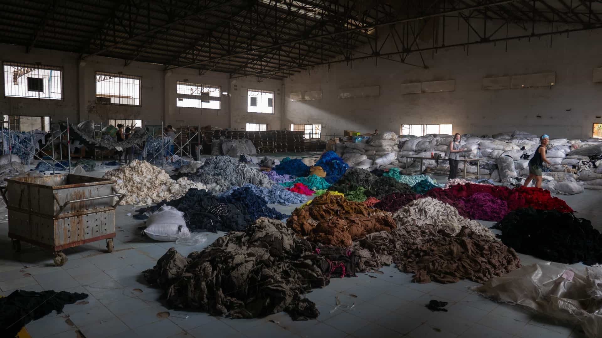 Torn fabrics on the floor of a factory
