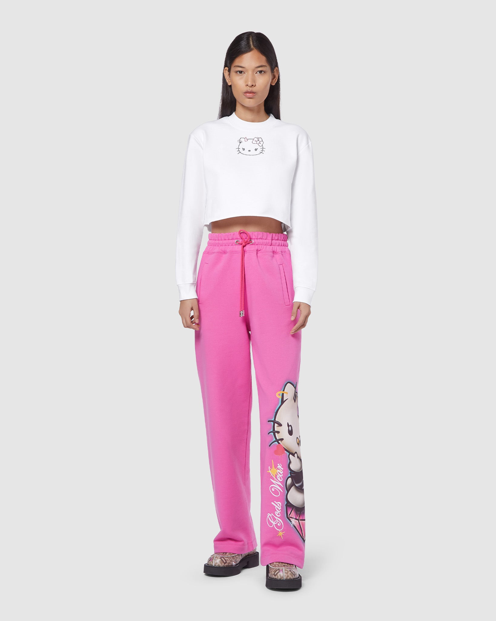 Hello Kitty wide sweatbottoms: Women Trousers Fuchsia | GCDS