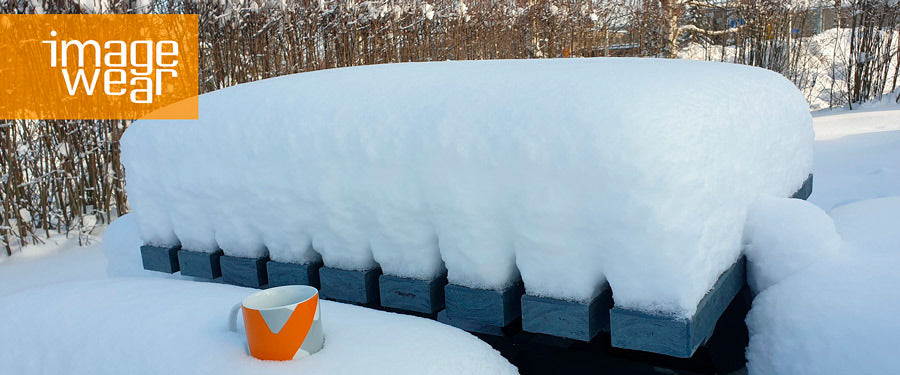 Kierre composite products also withstand frost and are suitable for outdoor use. Pictured is a picnic table under the snow.