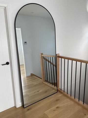 large arched mirror