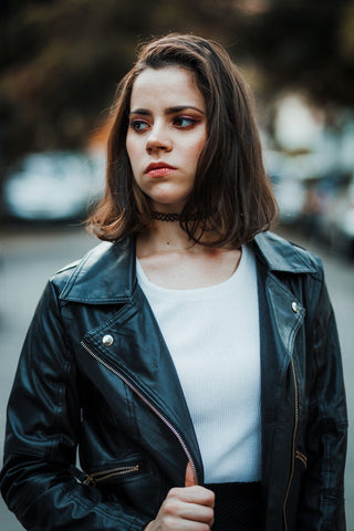 woman wearing choker necklace