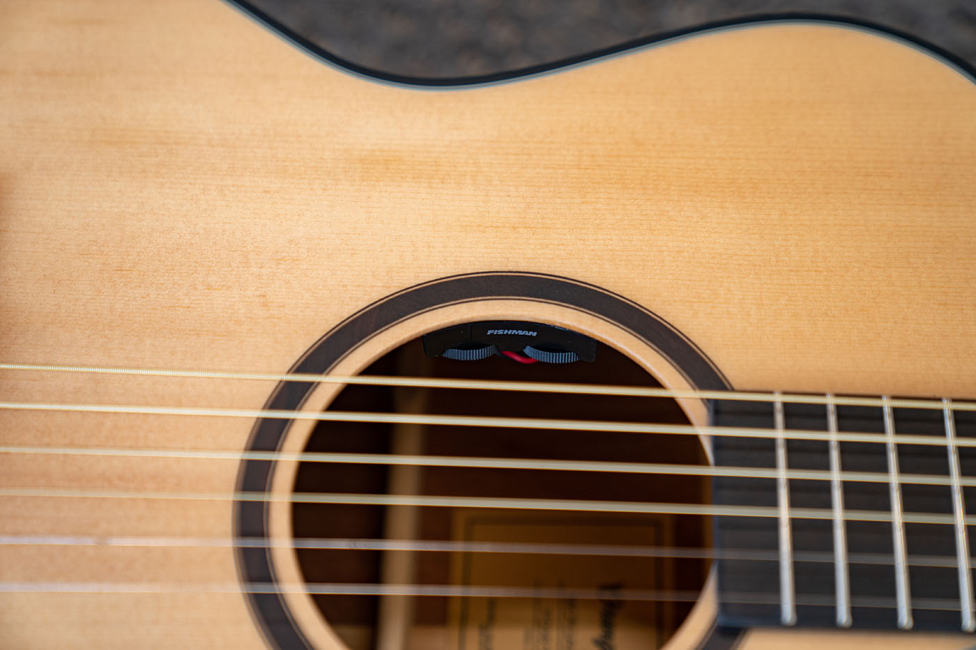 Closeup of the fishman sonitone EQ in a guitar soundhole