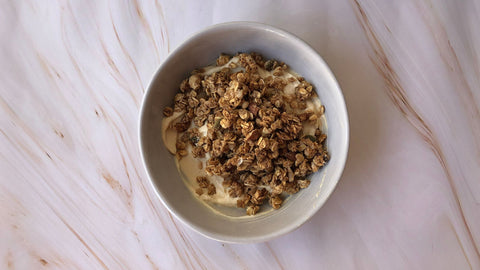 Bold yoghurt and muesli bowl  top with muesli
