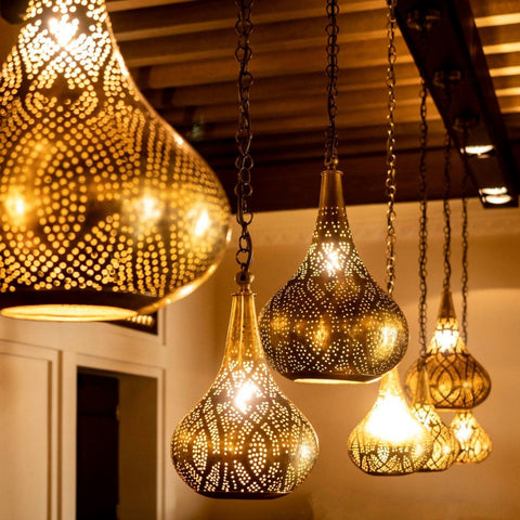 Group of Moroccan Pendant Lights Hanging from the Ceiling