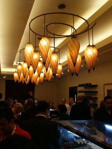 A Group of Hanging Ceiling Light Pendants inside a Hotel Dining