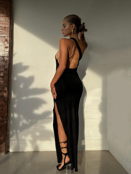 black open back dress and big gold earrings outfit