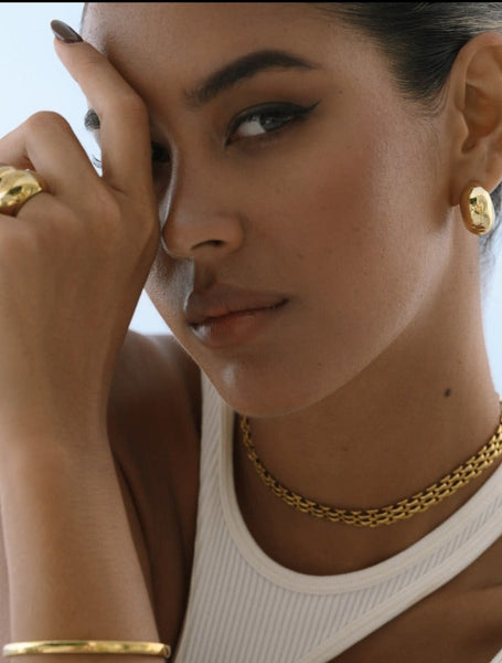 jewelry set of gold choker, earrings, bracelet and rings