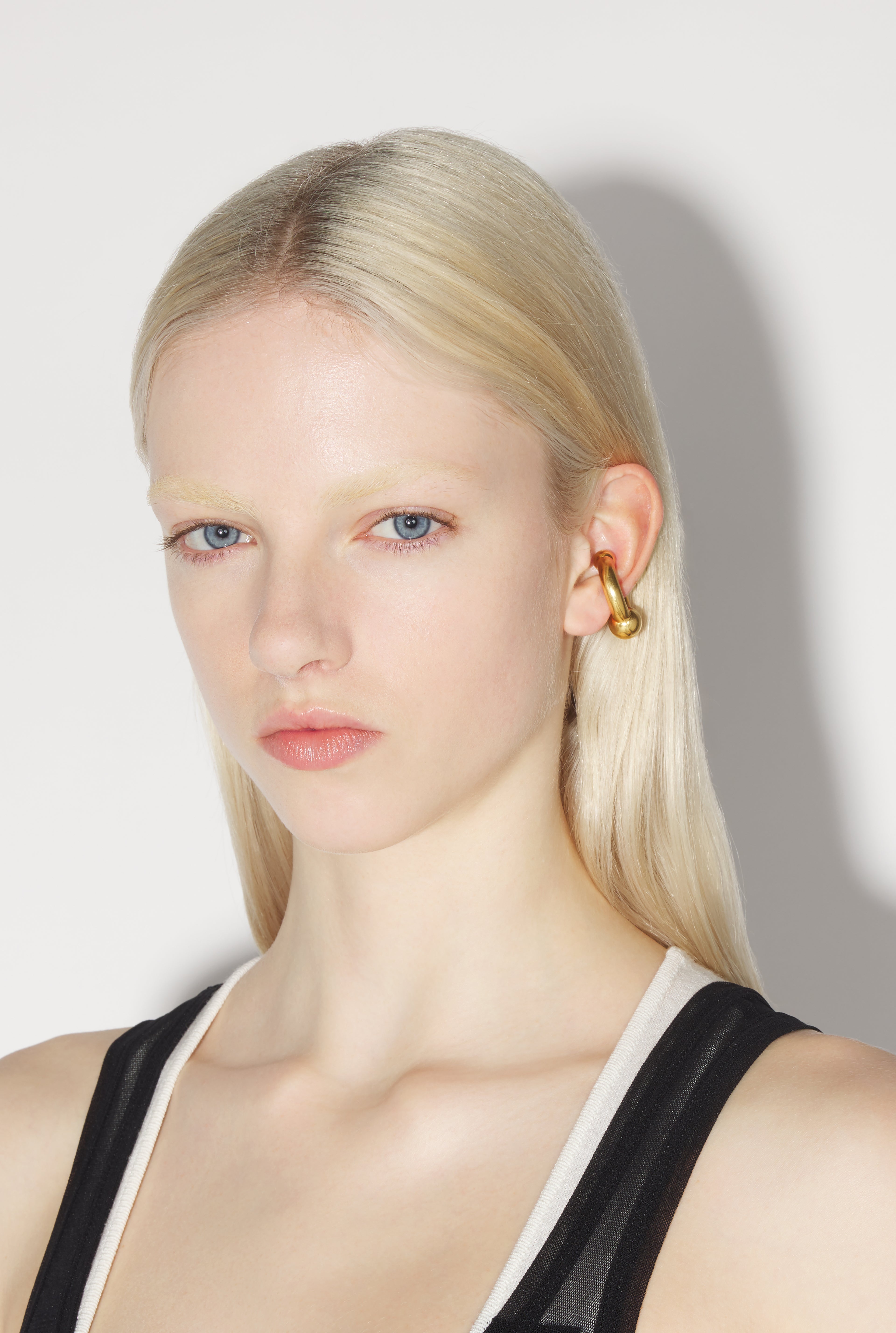 The Gold-Tone Piercing Ear Cuff