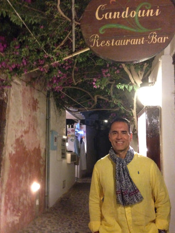 Gregory Cole, co-founder of the niche fragrance brand The Bubble Collection, enjoying the nightlife in Oia, Santorini