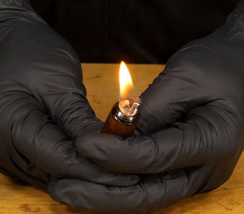 The finished lighter and flame.